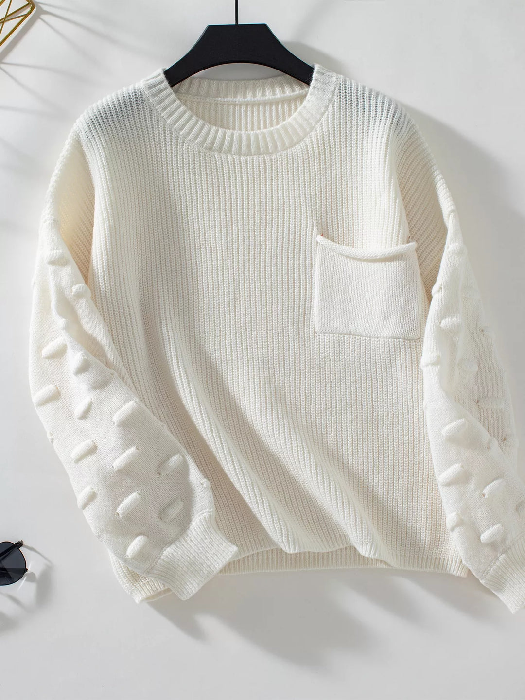 Ribbed knit round neck sweater with chest pocket