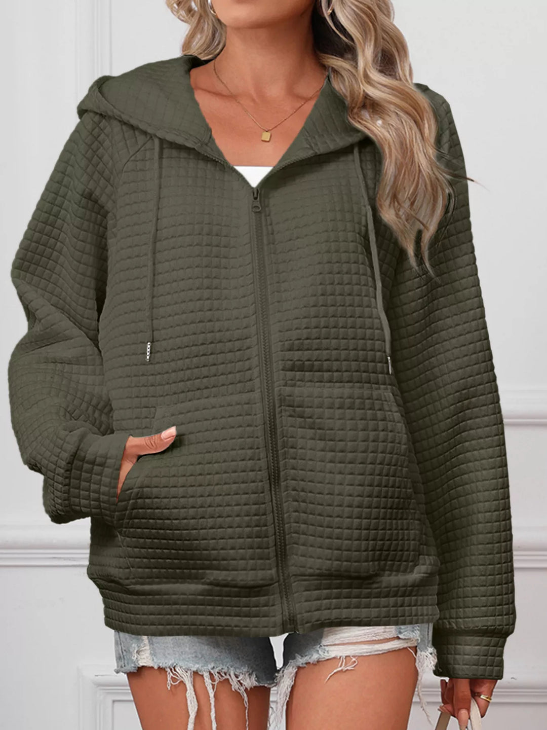 Textured quilted zip-up hooded jacket with pockets