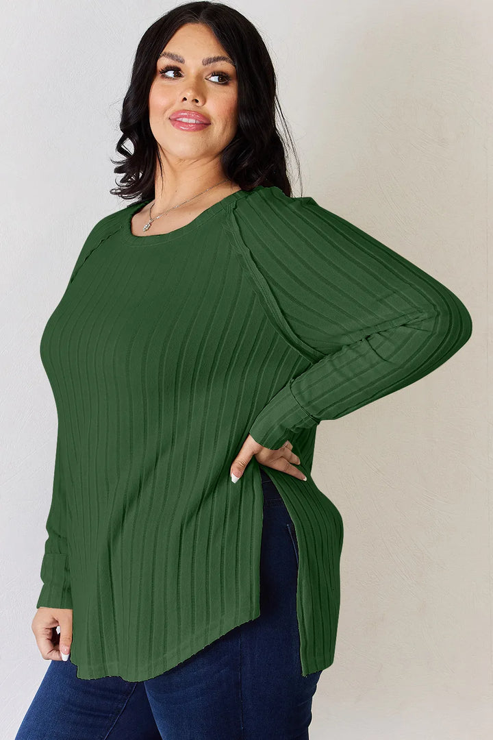Ribbed knit round neck long sleeve top with side slits