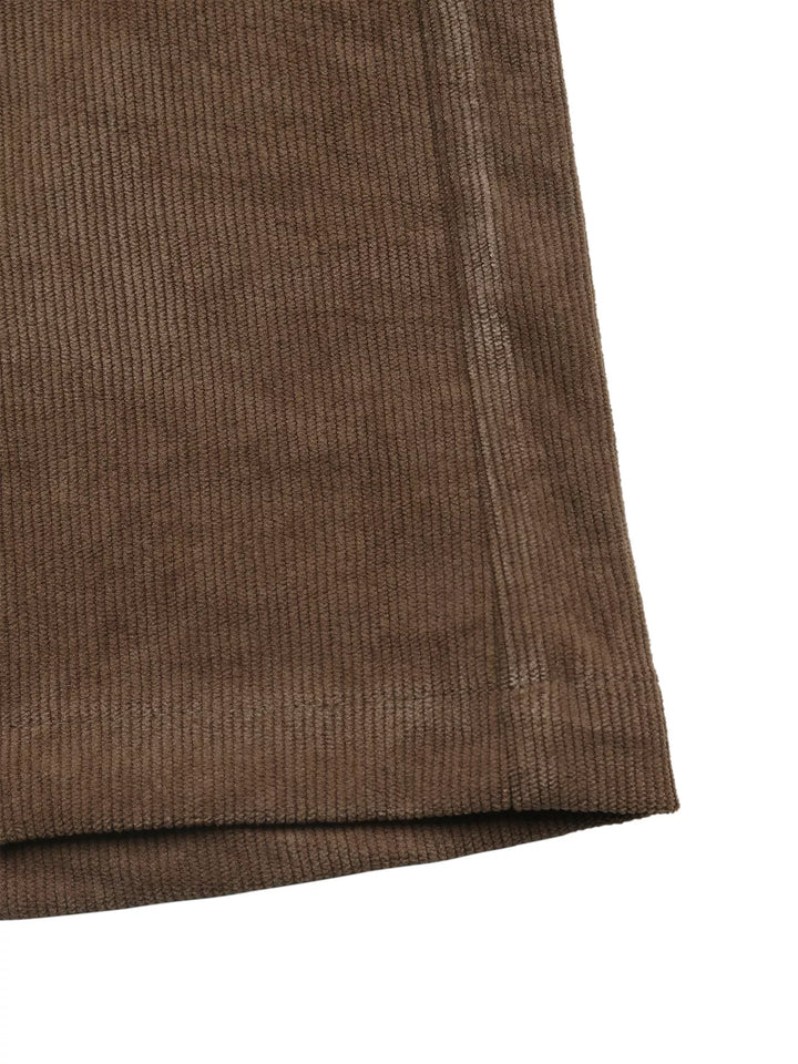 Wide-leg high-rise pants with button waist and deep pockets