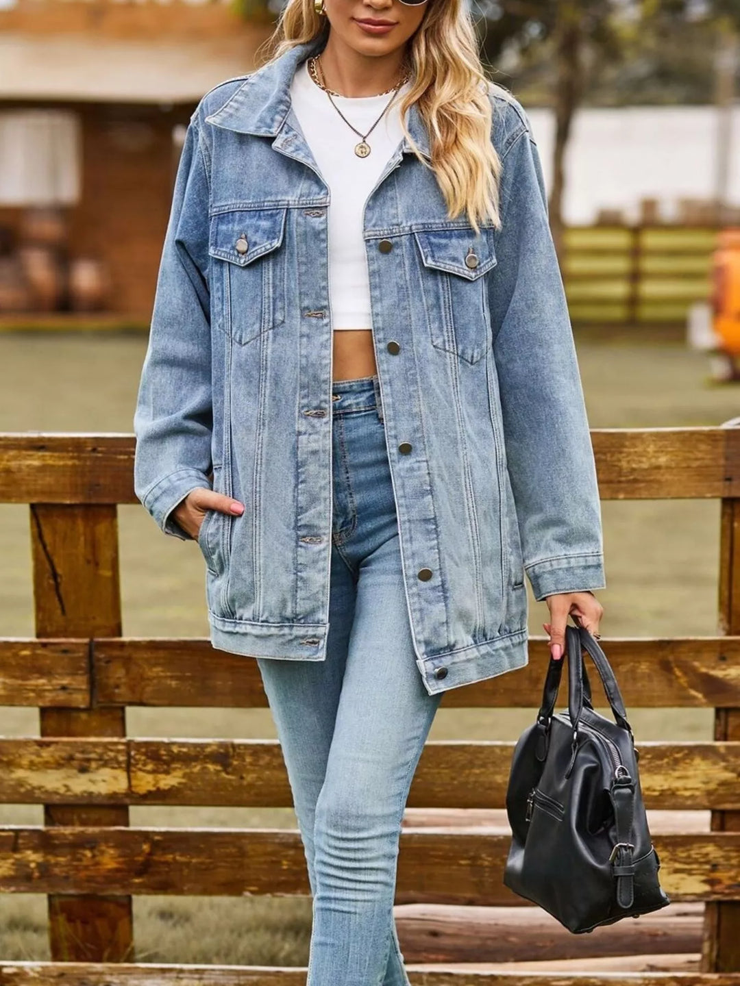 Oversized washed denim jacket with flap pockets