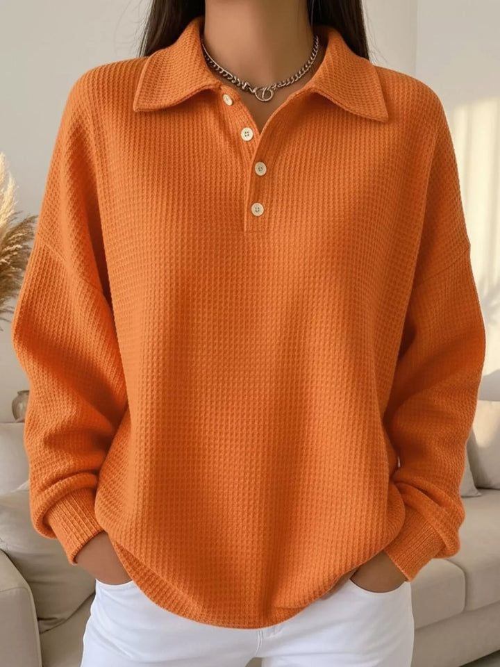 Orange Waffle knit collared pullover with button placket