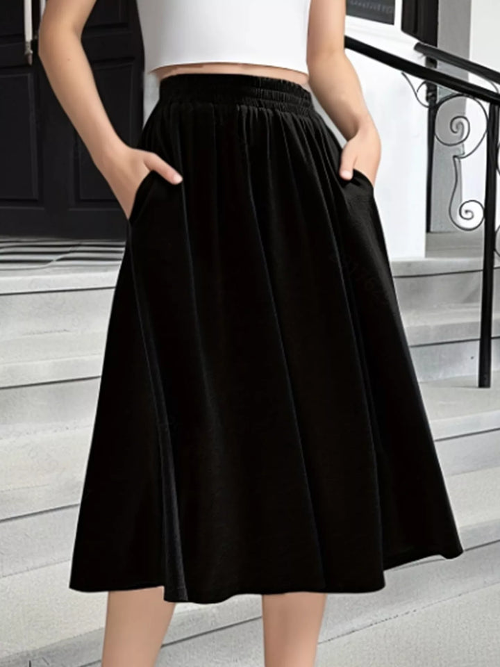 Elastic waist A-line midi skirt with pockets