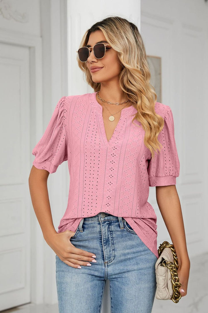 Pink Eyelet puff sleeve top with notched V-neck