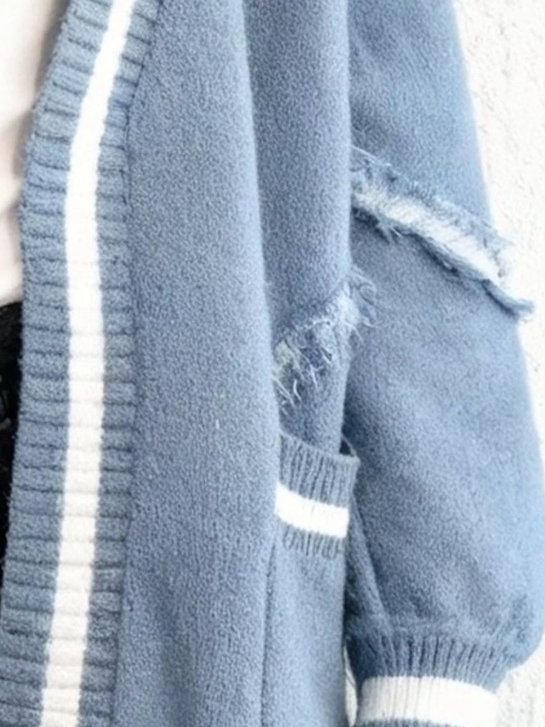 Frayed exposed-seam open front cardigan with striped trim
