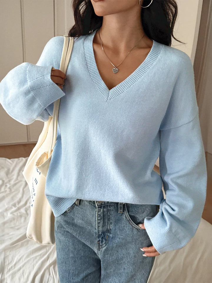 Light Blue V-neck loose knit sweater with ribbed trim