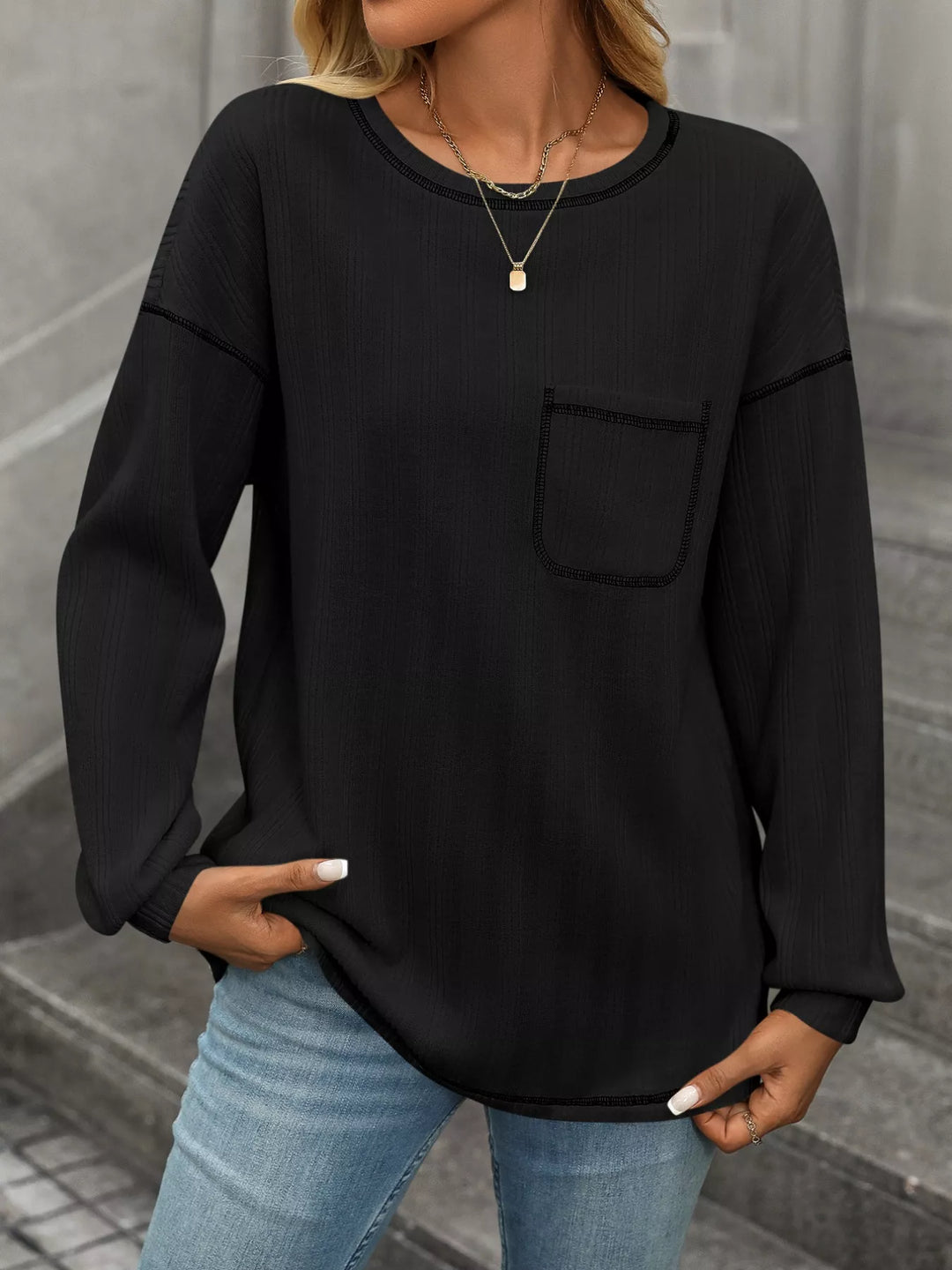 Contrast stitch long sleeve top with patch pocket