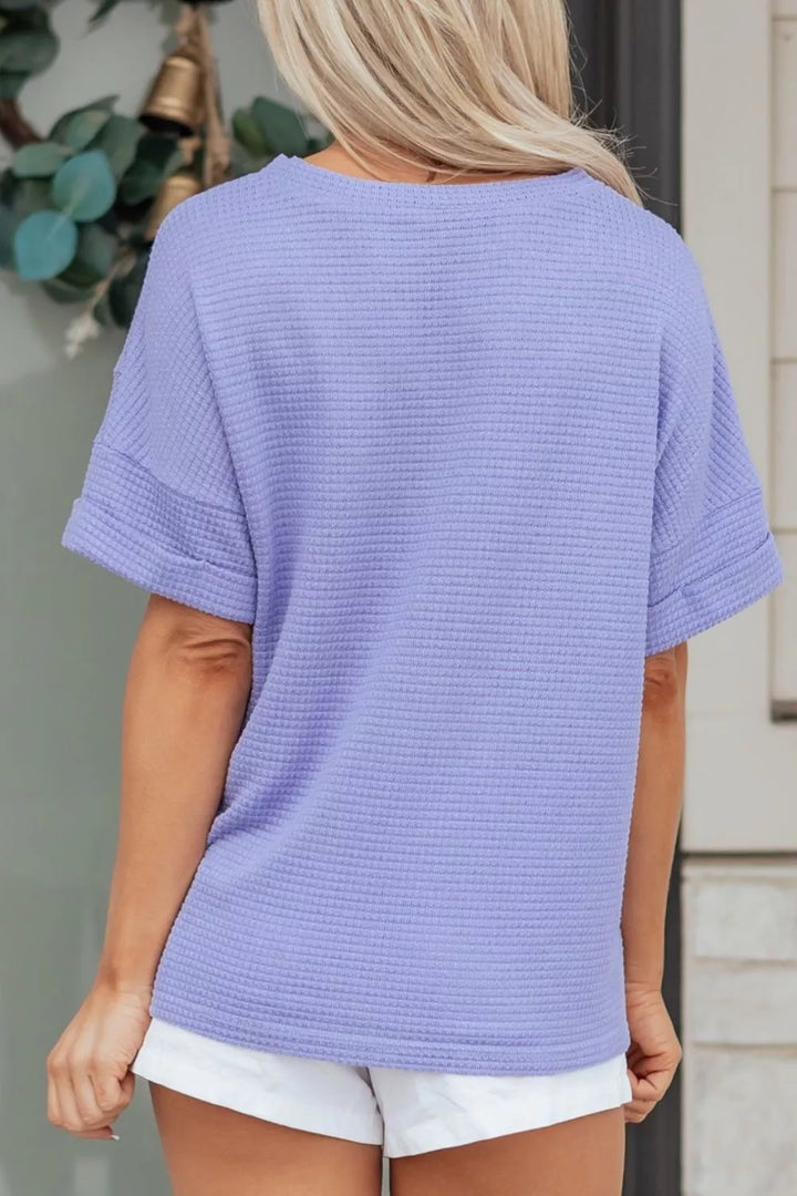 Plus size waffle knit V-neck top with cuffed short sleeves