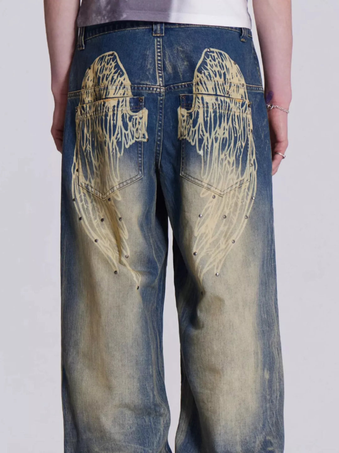 Vintage wash mid-rise wide leg jeans with panel seams