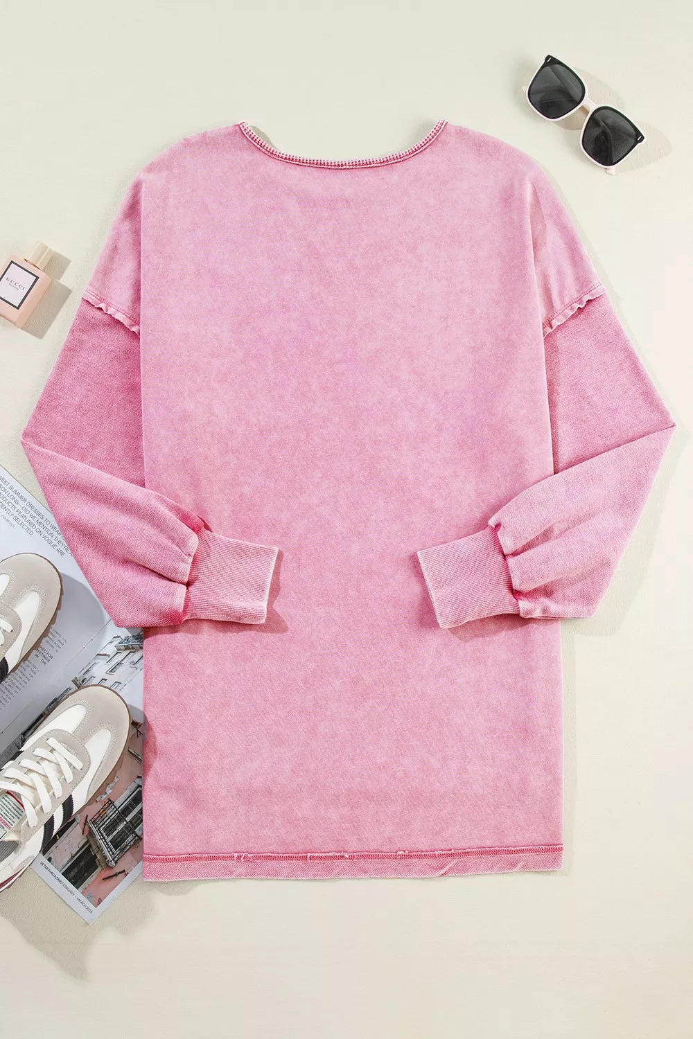 Vintage wash oversized sweatshirt with exposed seams and side slits