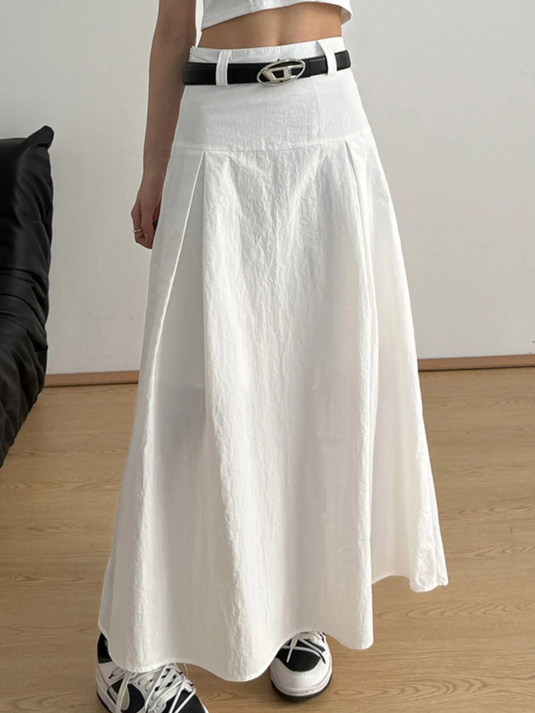 White High-rise A-line maxi skirt with front pleats