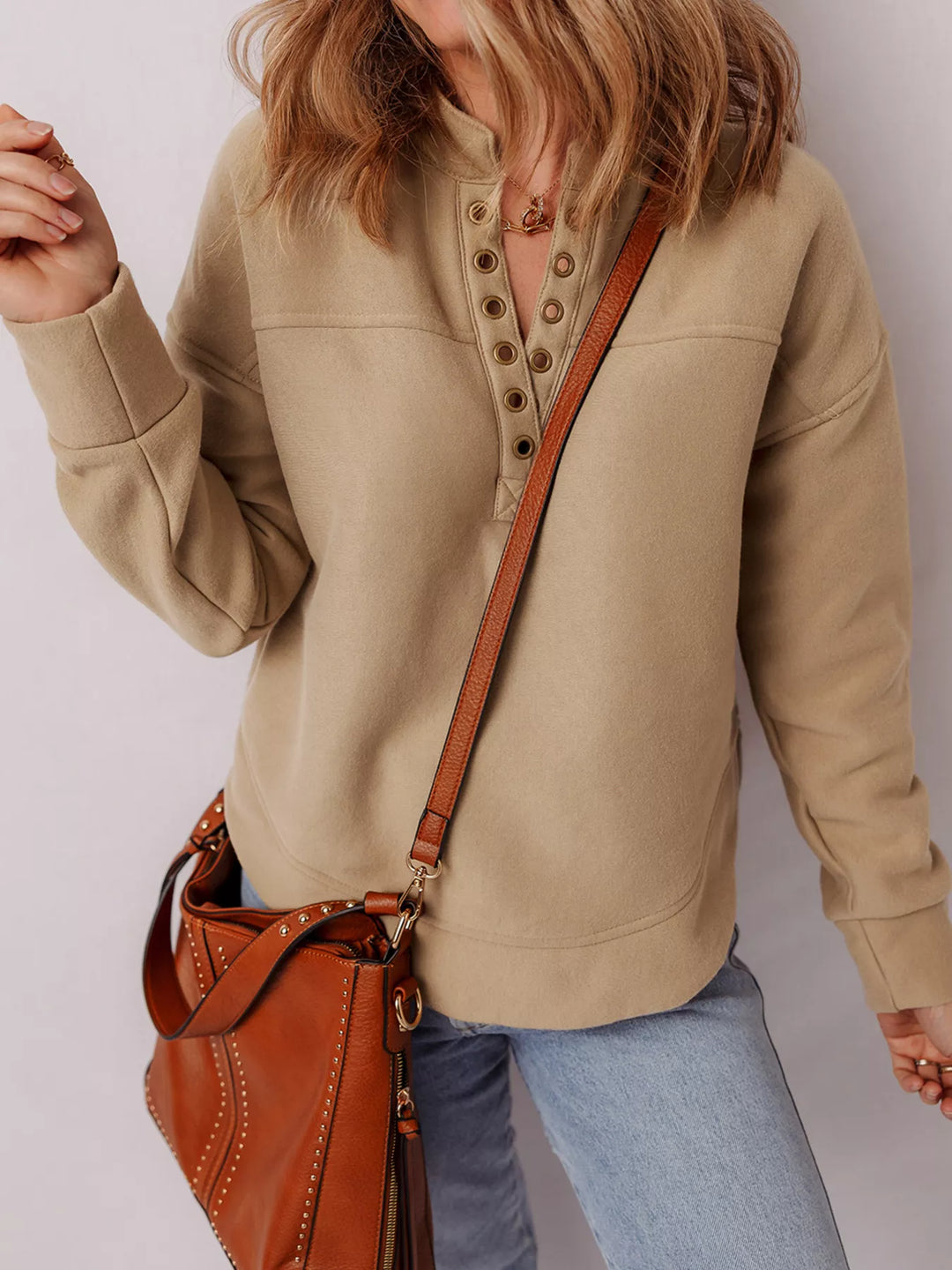 Grommet placket V-neck pullover sweatshirt