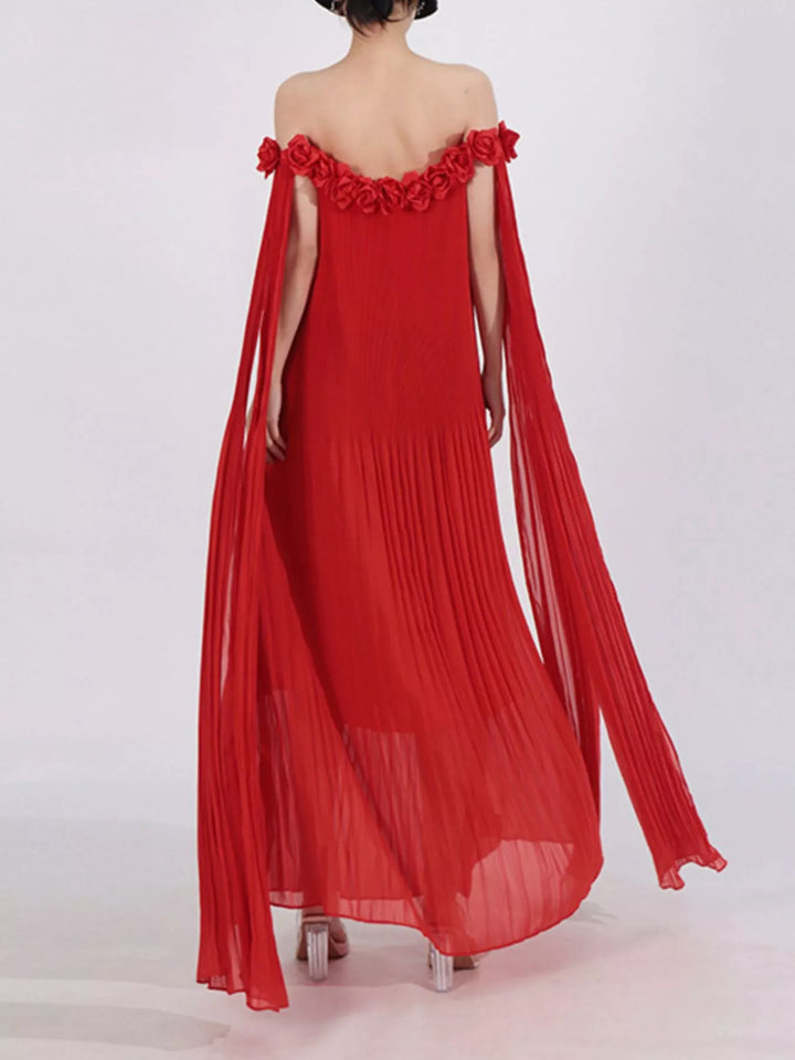 Off-shoulder pleated maxi dress with rosette neckline