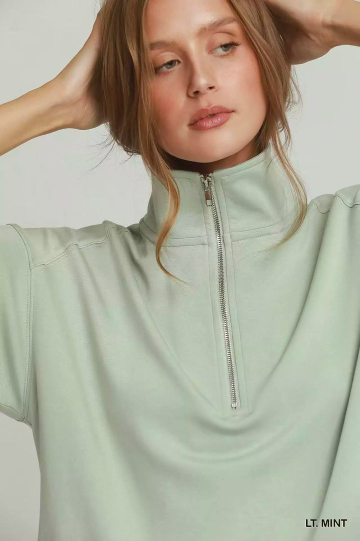 Scalloped hem half-zip short-sleeve pullover
