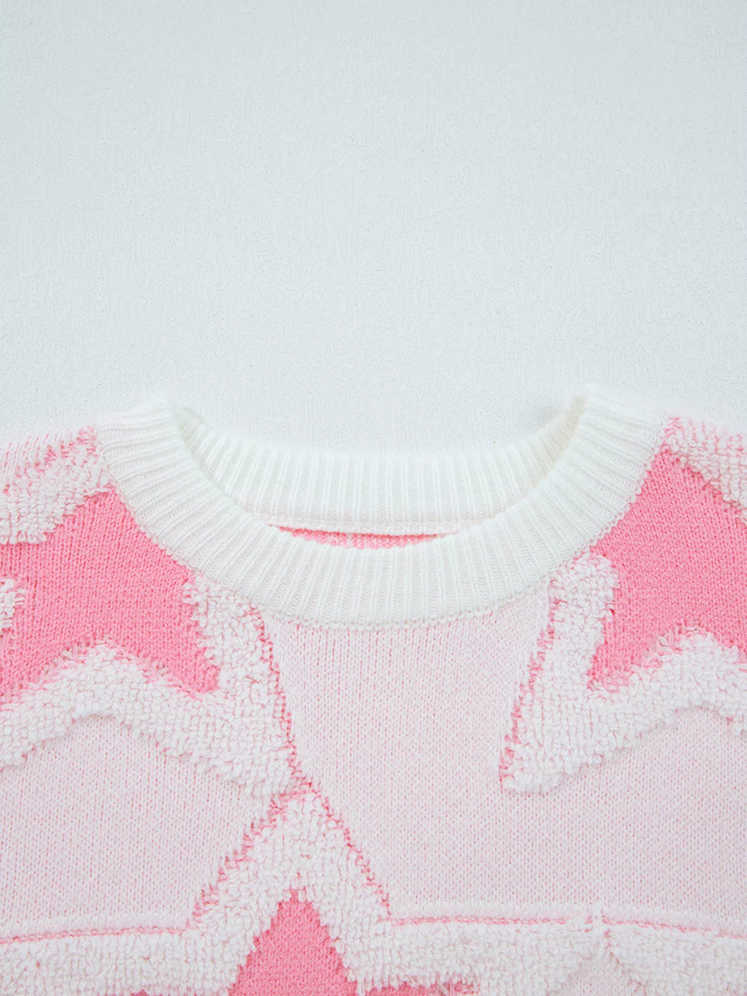 Oversized star knit sweater with drop shoulders and ribbed trim