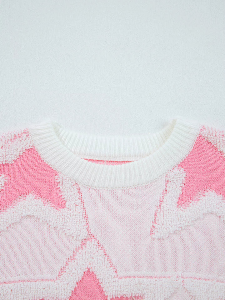 Oversized star knit sweater with drop shoulders and ribbed trim