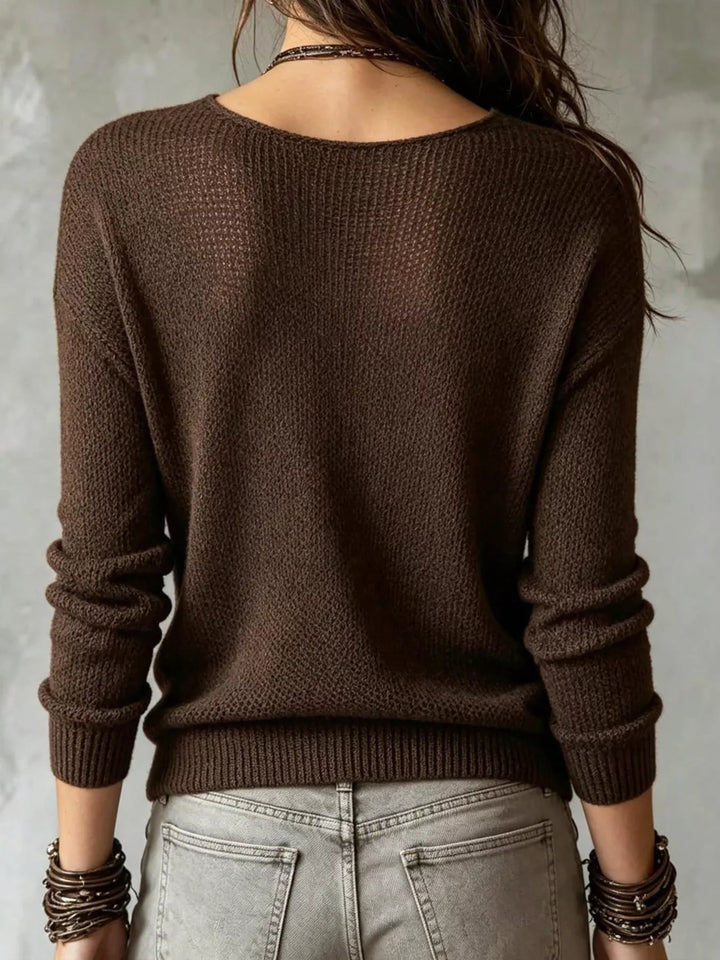 Waffle knit surplice wrap-front sweater with ribbed cuffs