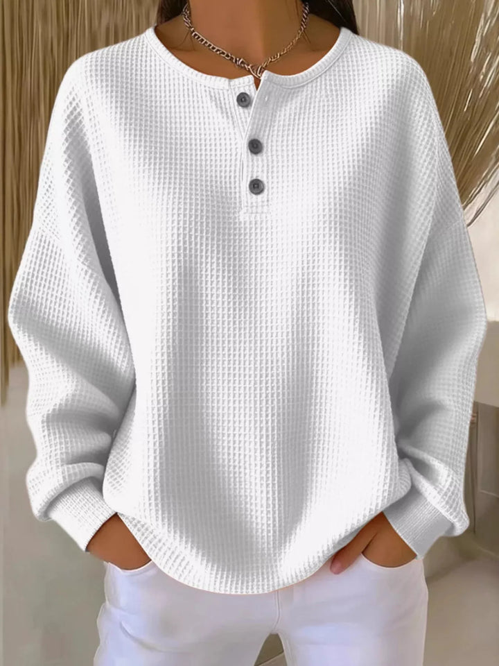 Waffle knit long sleeve henley top with button placket