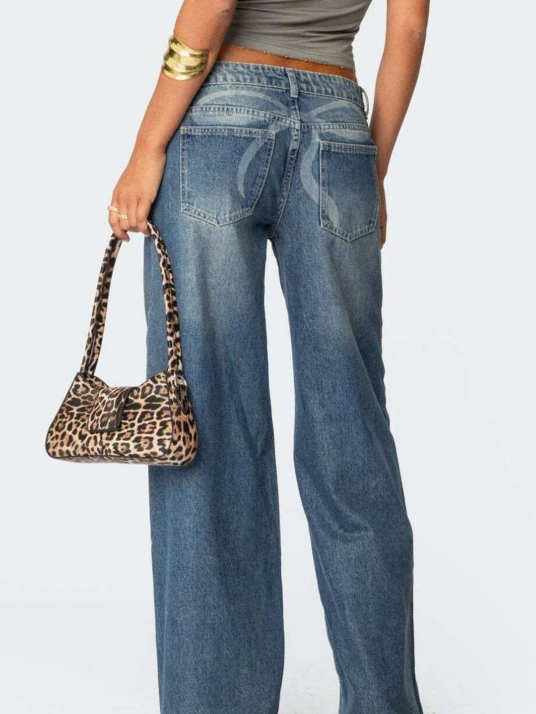 Vintage wash wide-leg jeans with whiskered fading