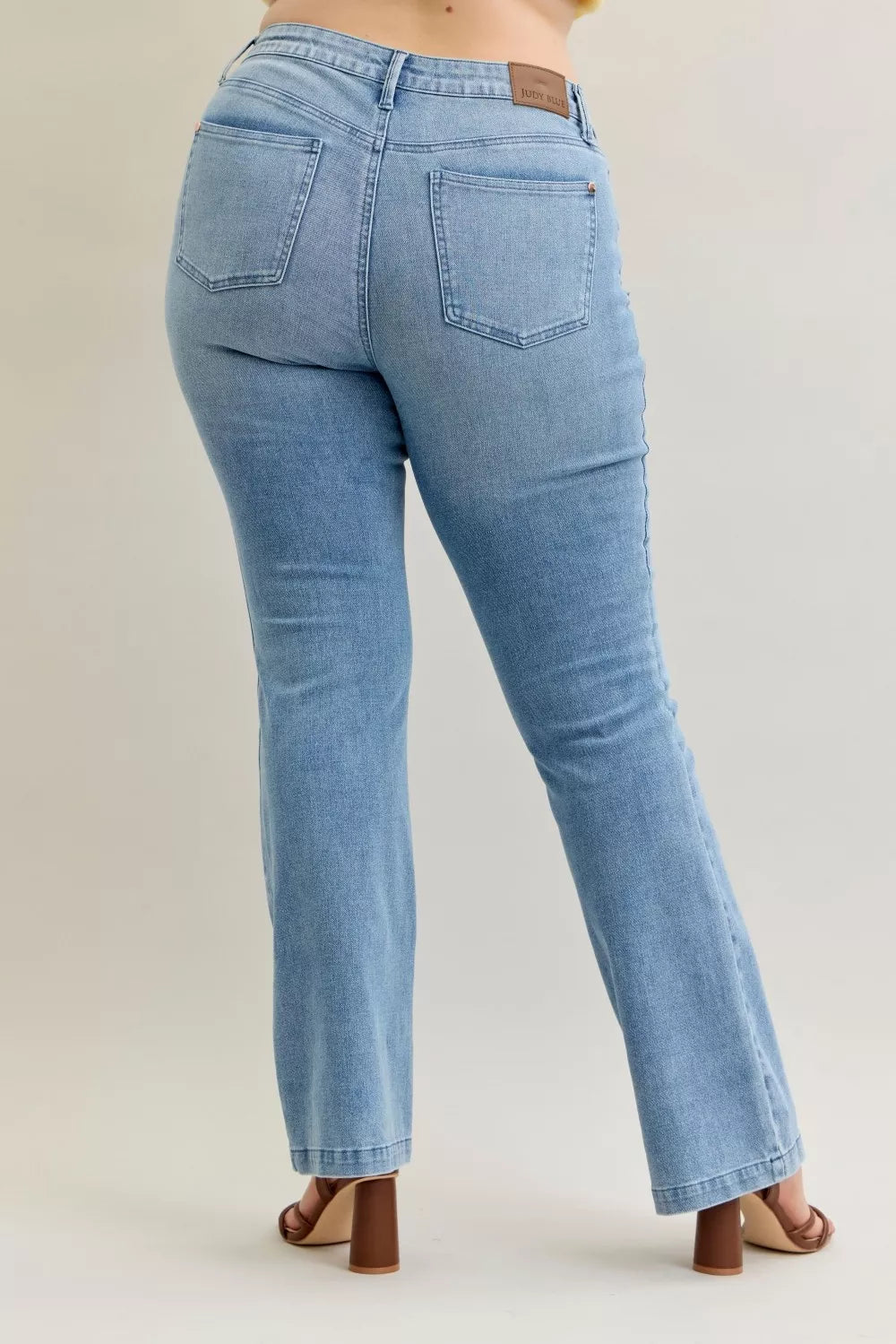 Mid-rise contrast wash bootcut jeans with front patch pockets