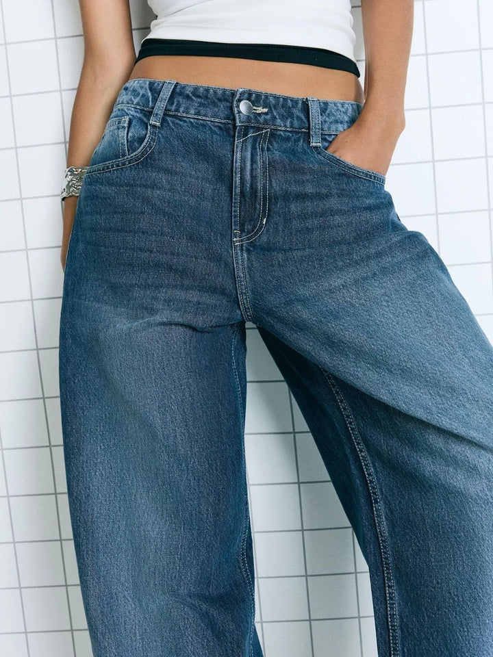 Mid-rise wide-leg washed denim jeans with five-pocket styling