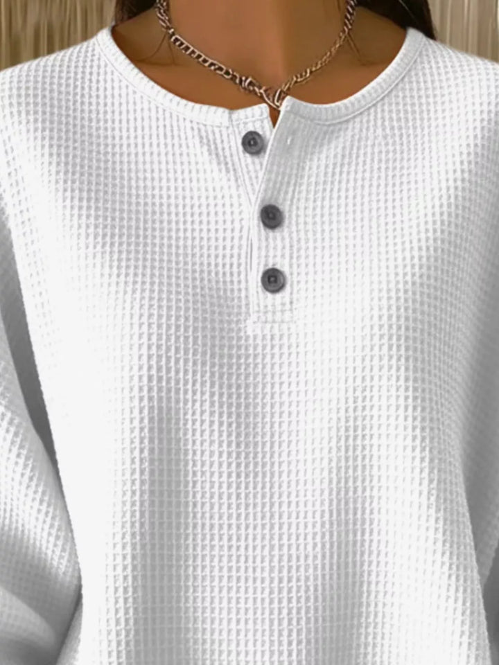 Waffle knit henley top with button placket and long sleeves