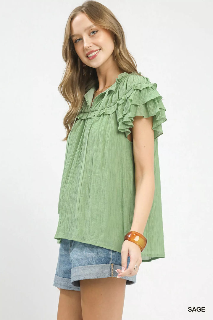 Tiered ruffle flutter sleeve tie-neck textured blouse