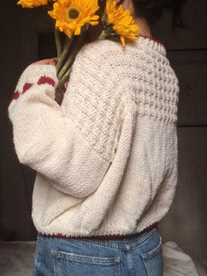 Chunky knit sweater with heart cuffs and contrast trim