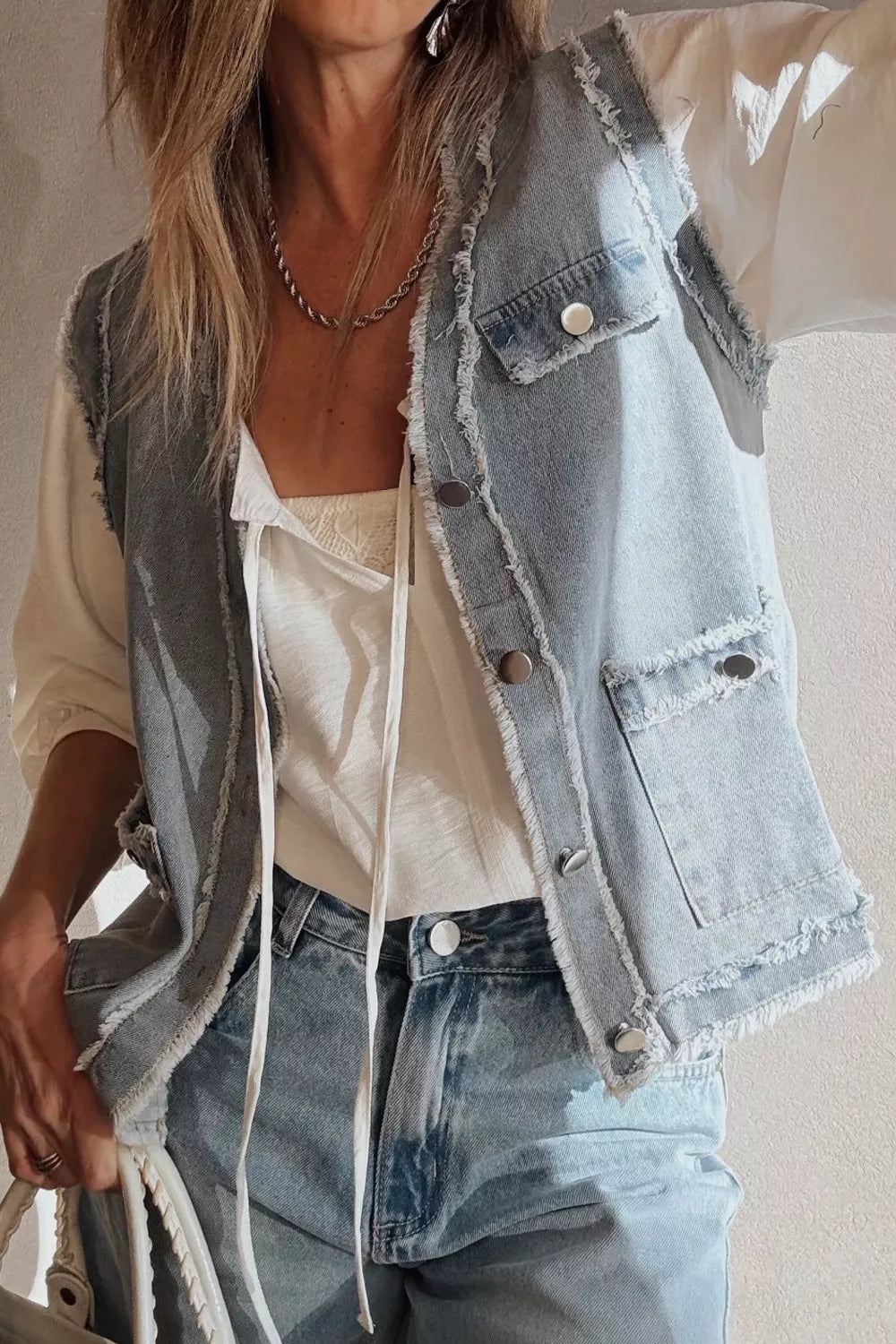 Light Blue Frayed edge denim vest with snap flap pockets