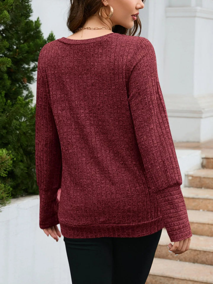 Ribbed knit V-neck long sleeve top with drop shoulders