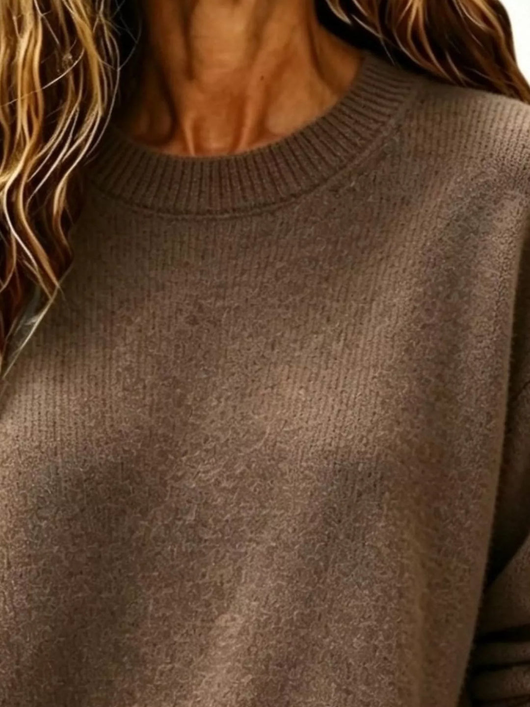 Soft brushed knit sweater with ribbed cuffs and drop shoulders
