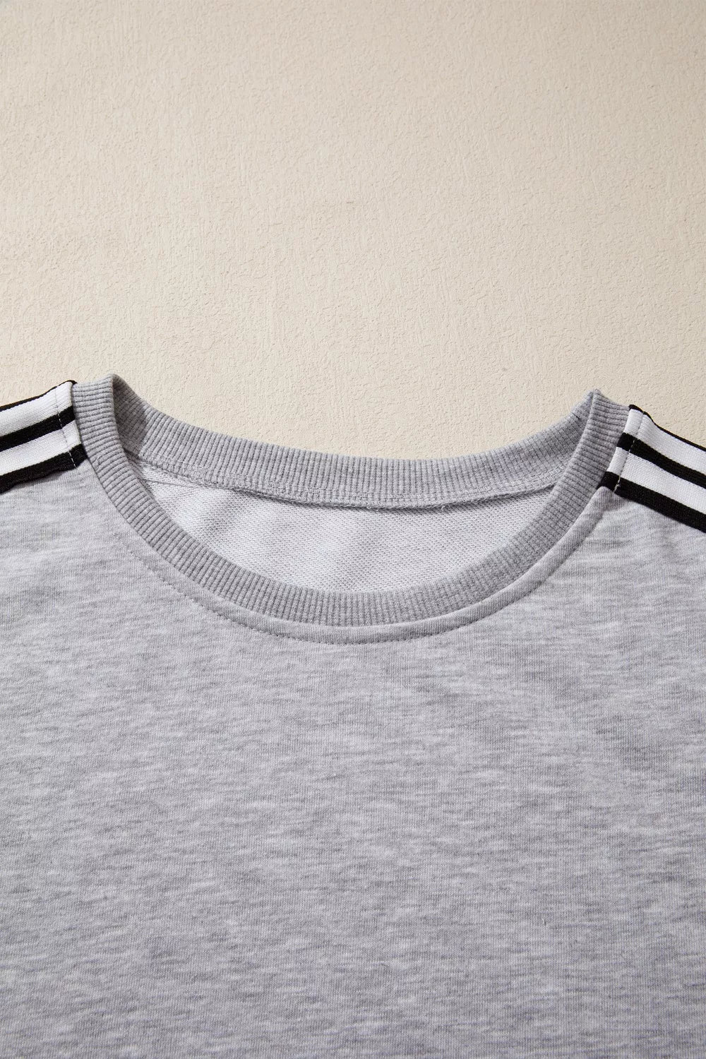 Relaxed fit tee with varsity shoulder stripes