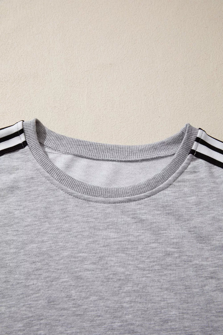 Relaxed fit tee with varsity shoulder stripes