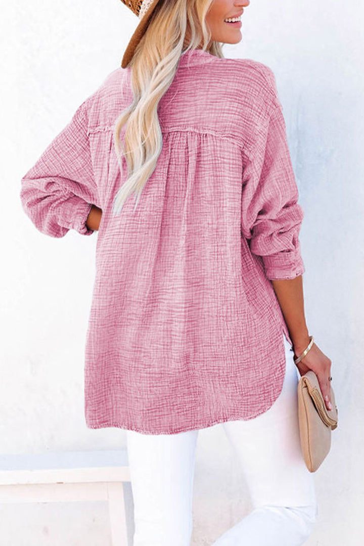 Textured cotton blouse with half-button placket and long sleeves