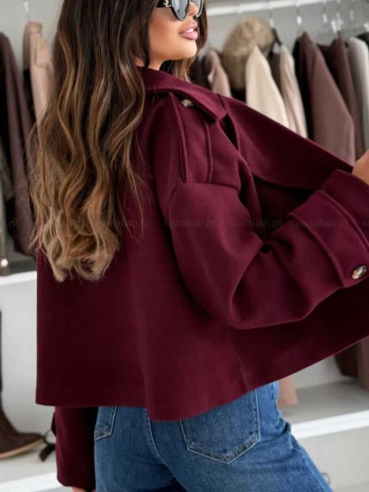 Double-breasted cropped coat with notch lapels and button cuffs