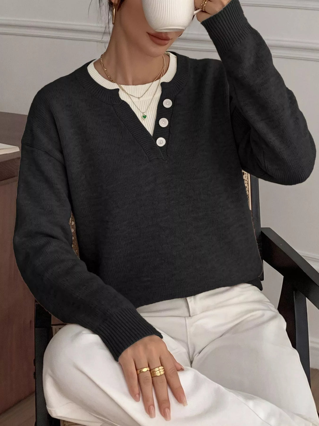 Three-button henley placket knit sweater with ribbed trim