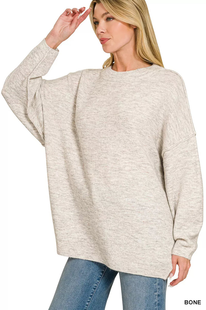 Oversized exposed-seam melange crew neck sweater