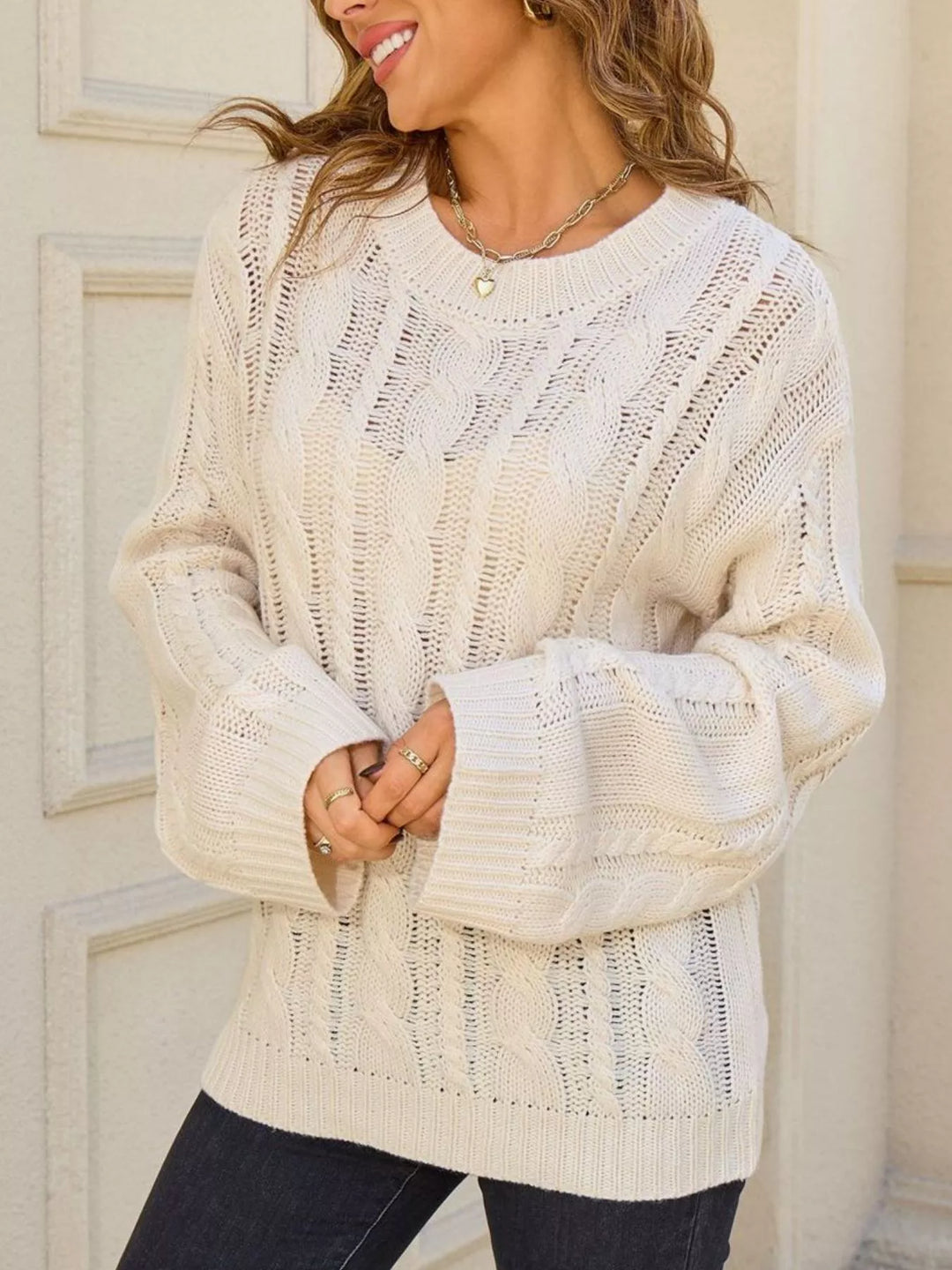 Openwork cable knit long sleeve crew neck sweater