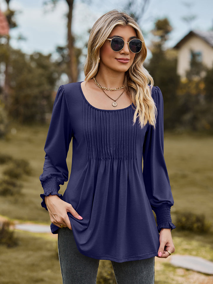 Navy Pintuck pleated puff sleeve blouse with smocked cuffs