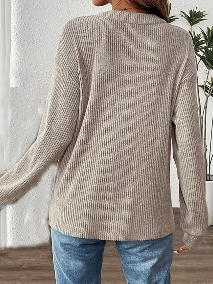 Ribbed knit long sleeve henley top with button placket