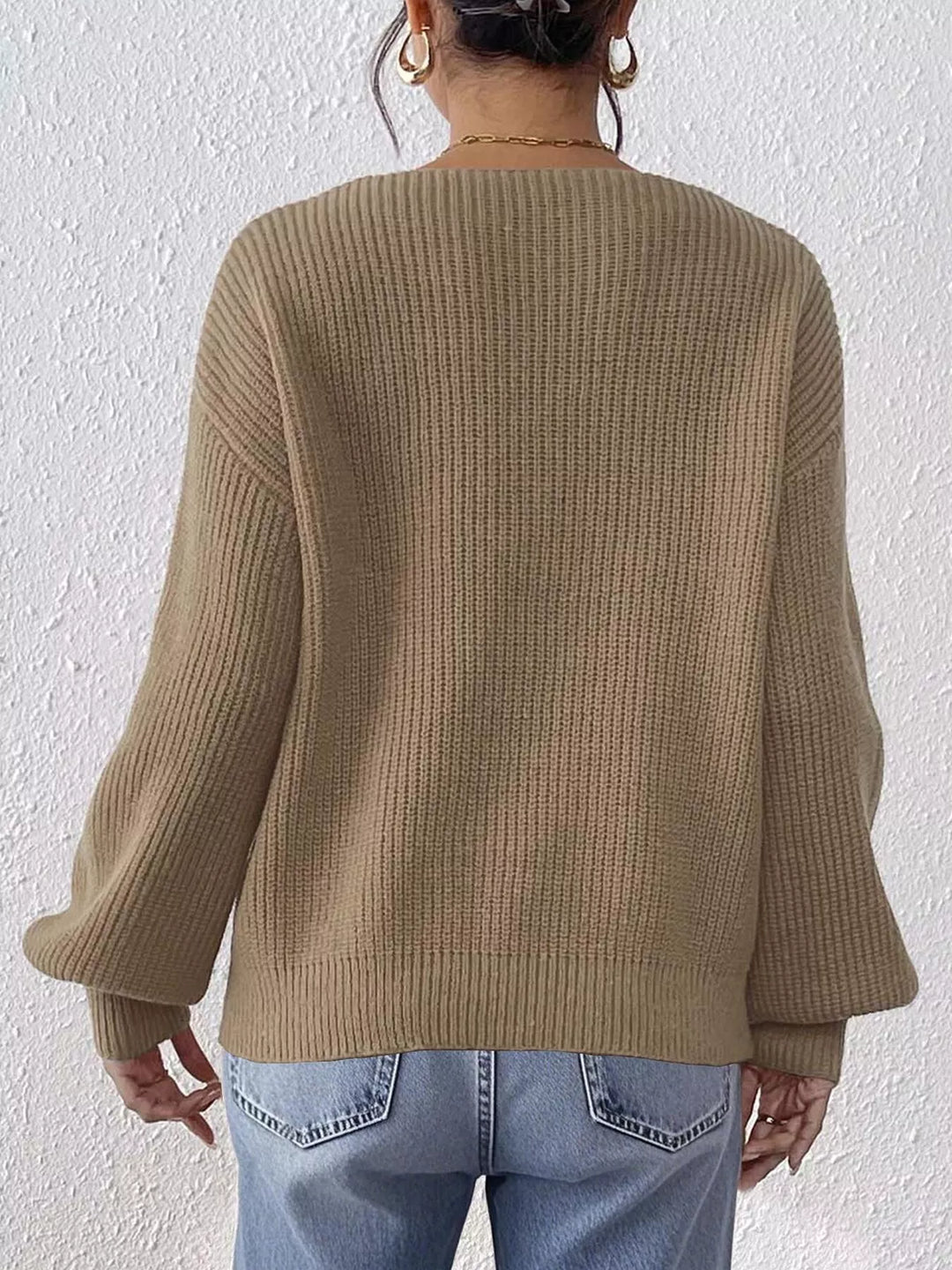 Ribbed knit V-neck sweater with bow-tie sleeves