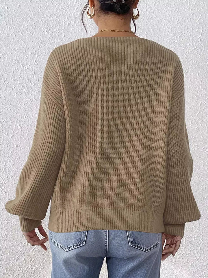 Ribbed knit V-neck sweater with bow-tie sleeves