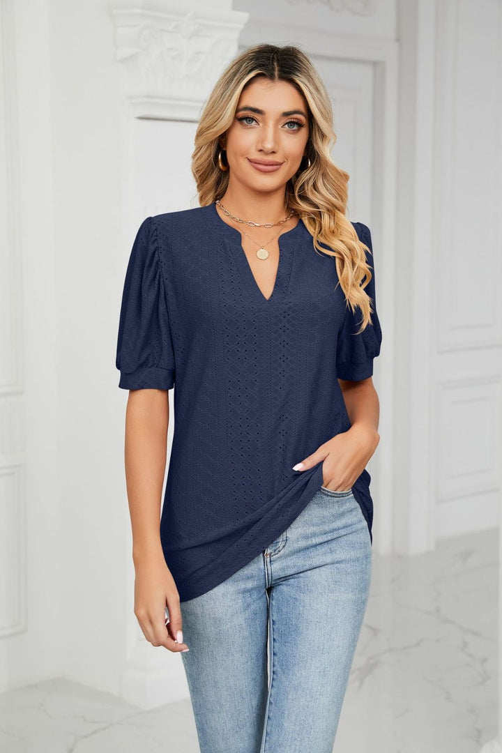 Dark Navy Eyelet puff sleeve top with notched V-neck