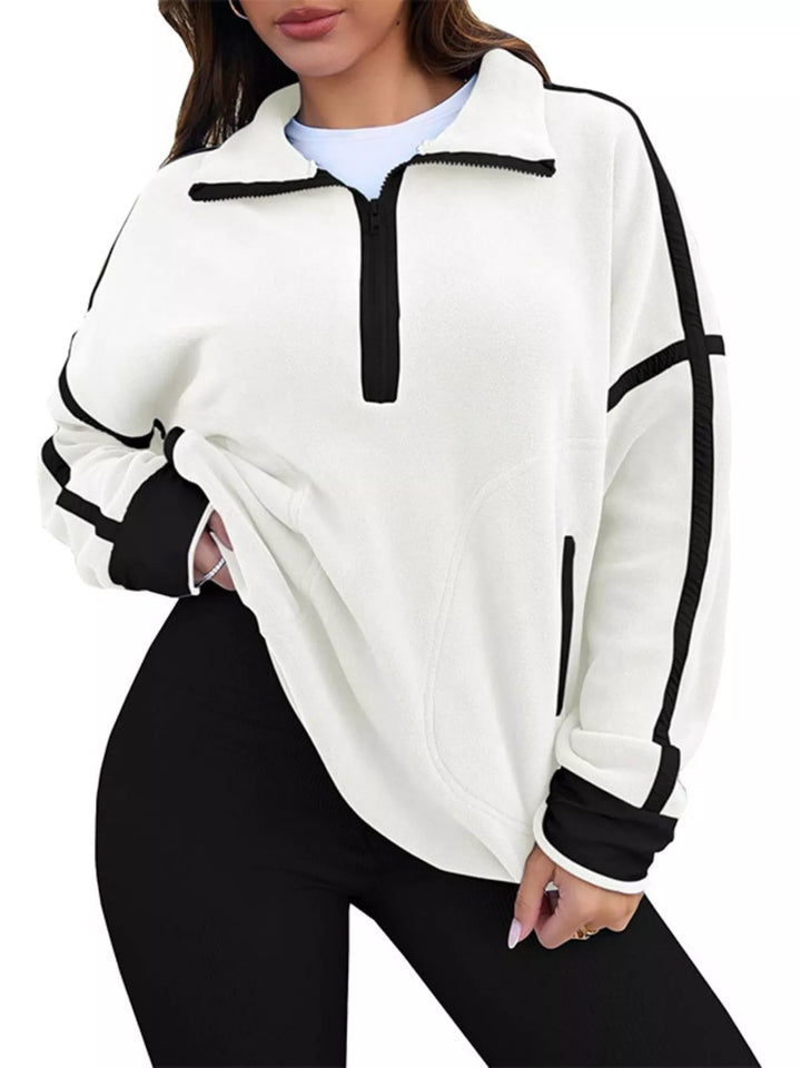 Half-zip fleece pullover with contrast trim and zip pockets