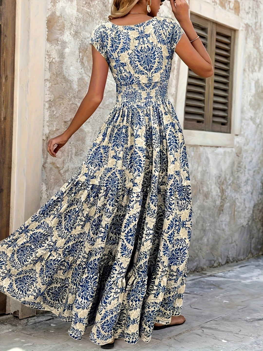 Smocked tiered maxi dress with cap sleeves and side slit