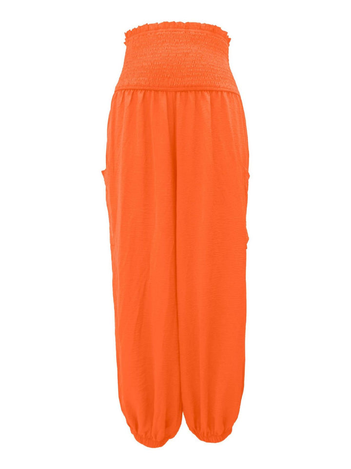 High-rise smocked harem pants with side pockets