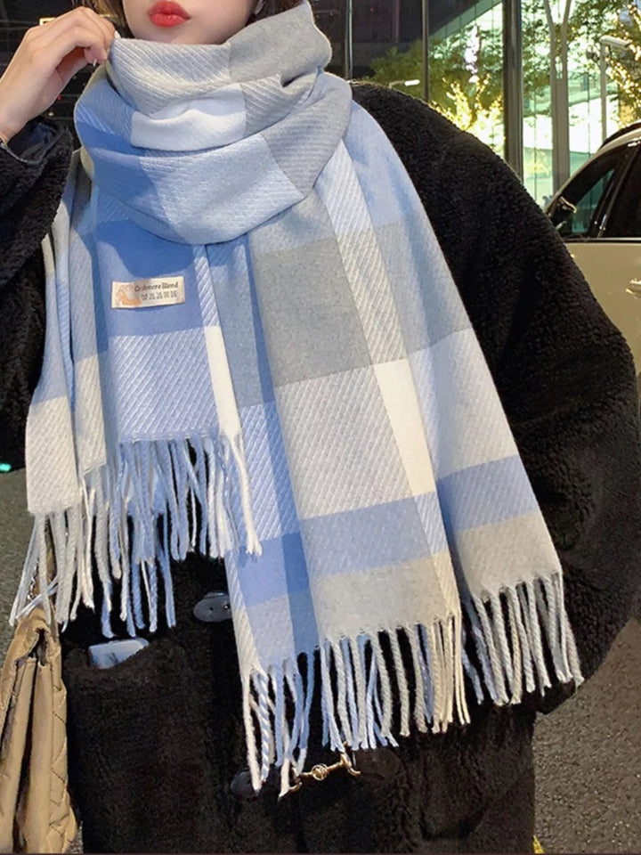 Oversized plaid wool scarf with fringe trim
