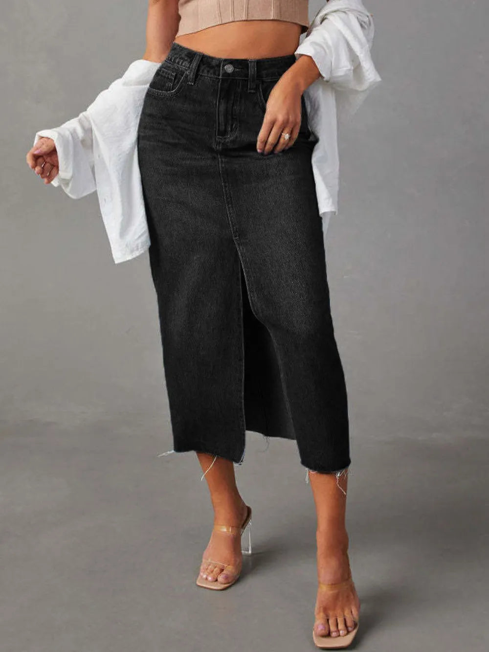Dark High-rise denim midi skirt with raw hem and front slit