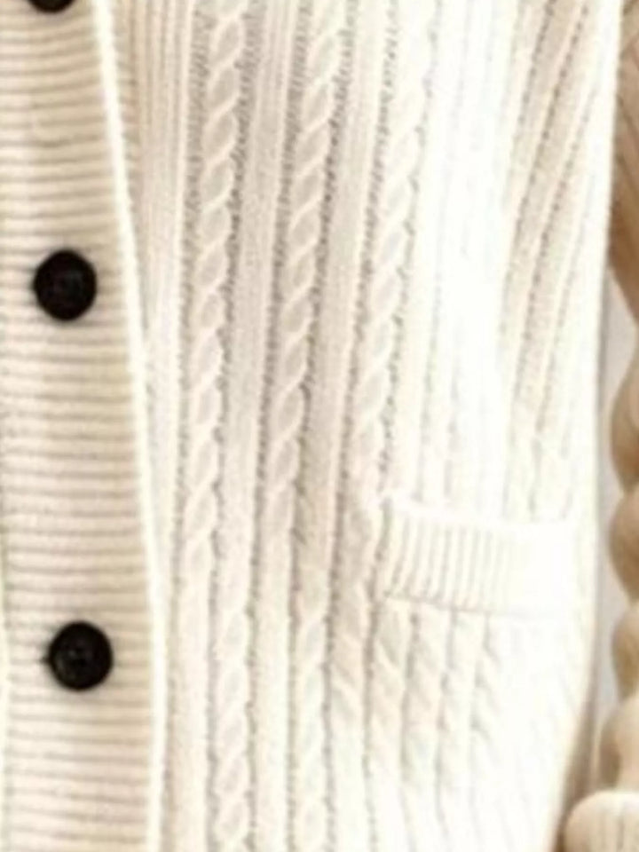 Shawl collar cable knit cardigan with patch pockets