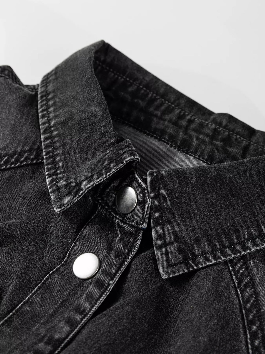 Loose-fit denim shirt dress with raw hem and chest pockets